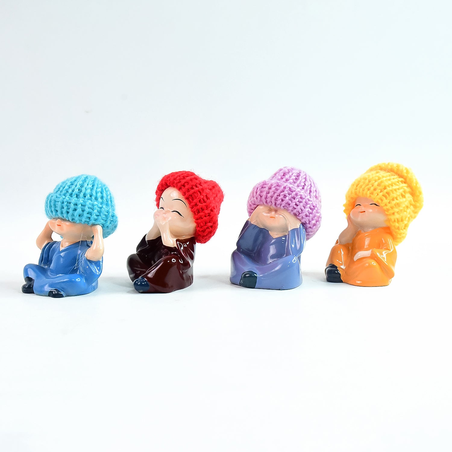 Decorative Resin Monk Buddha Showpiece Set Of 4 With Traditional Straw Hats