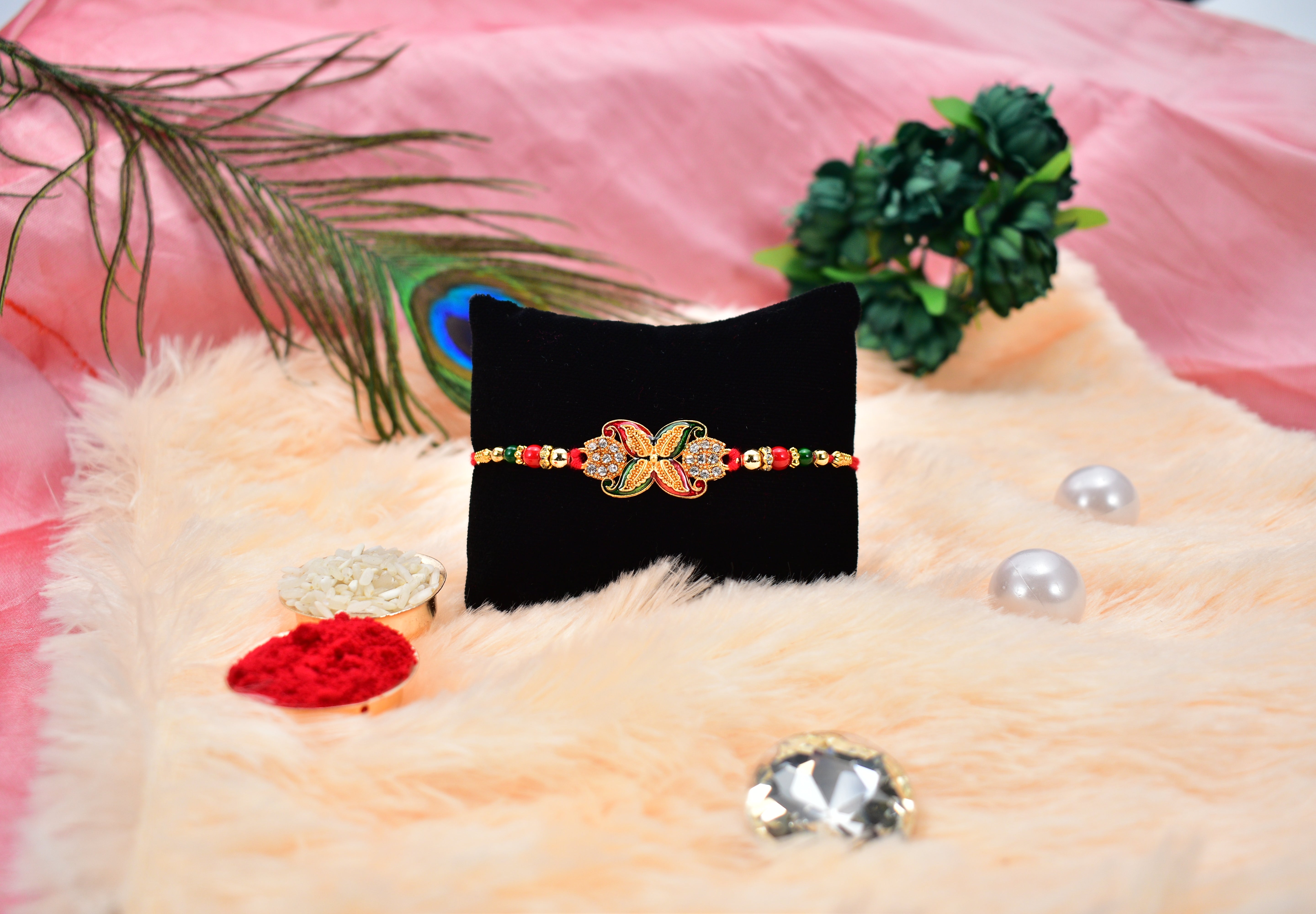 Elegant Red-green Bead Rakhi With Intricate Golden Flower Motif